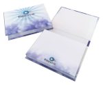 A hard cover notepad with a colourful design, featuring a blue and white cover and blank white pages inside.