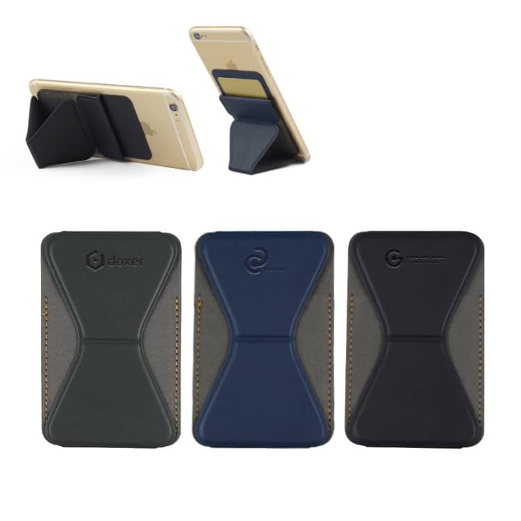 A collection of PU phone stand card holders in green, navy, and black, featuring a logo on some designs. PU Phone Stand Card Holder - Image 1