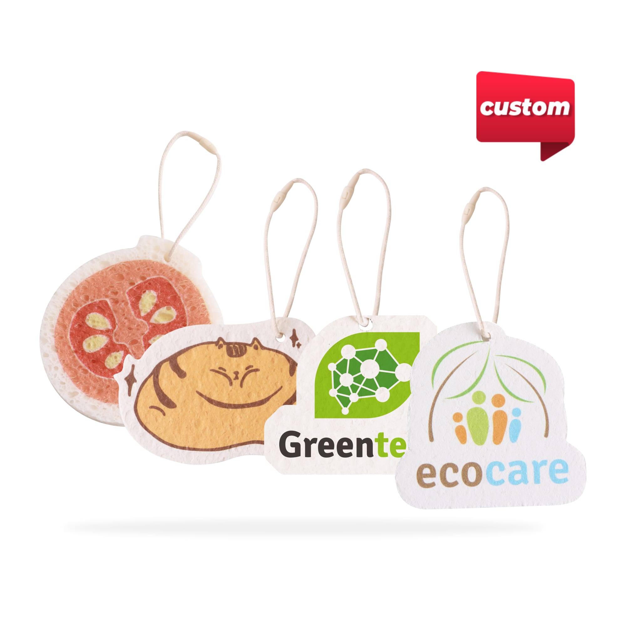 Four custom-shaped air freshener tags in various colours, featuring food and eco-friendly designs, with hanging strings. Custom Expandable Dishwashing Sponge - Image 1