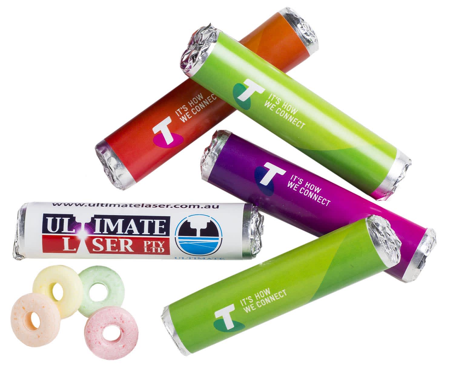 A selection of colourful mixed lollies wrapped in vibrant packaging, featuring one logo. Four lollies are visible in various shades. Holey Roll - Image 1