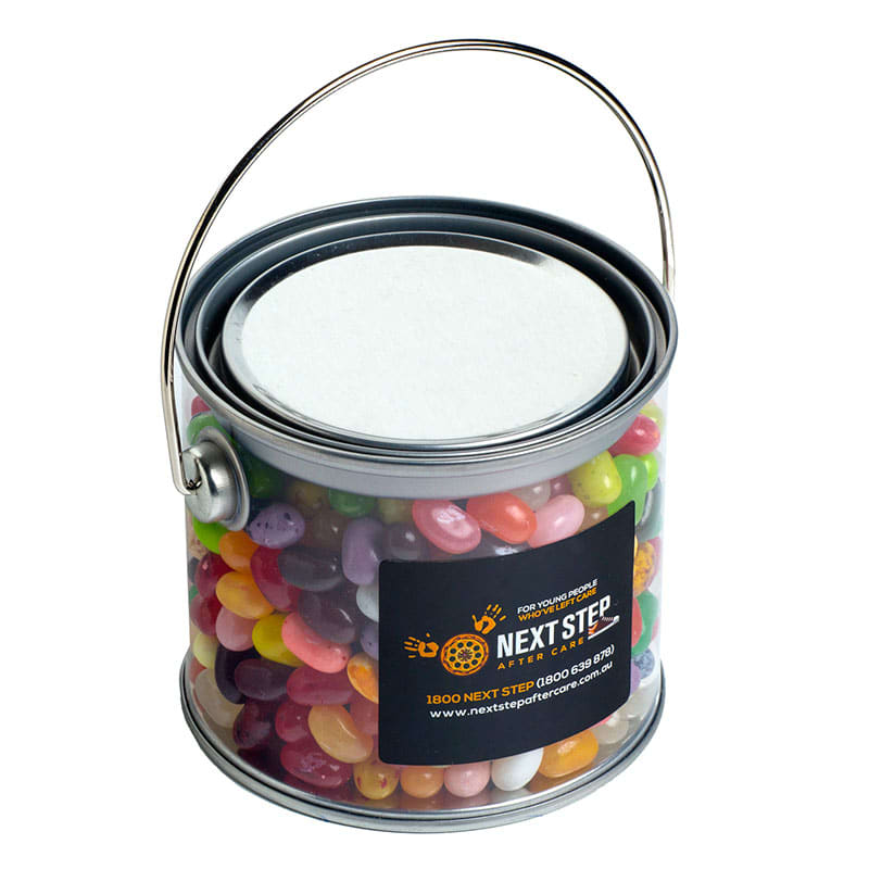 A medium PVC bucket filled with colourful JELLY BELLY jelly beans, featuring a silver handle and a branded logo. Medium PVC Bucket with JELLY BELLY Jelly Beans 400g - Image 1