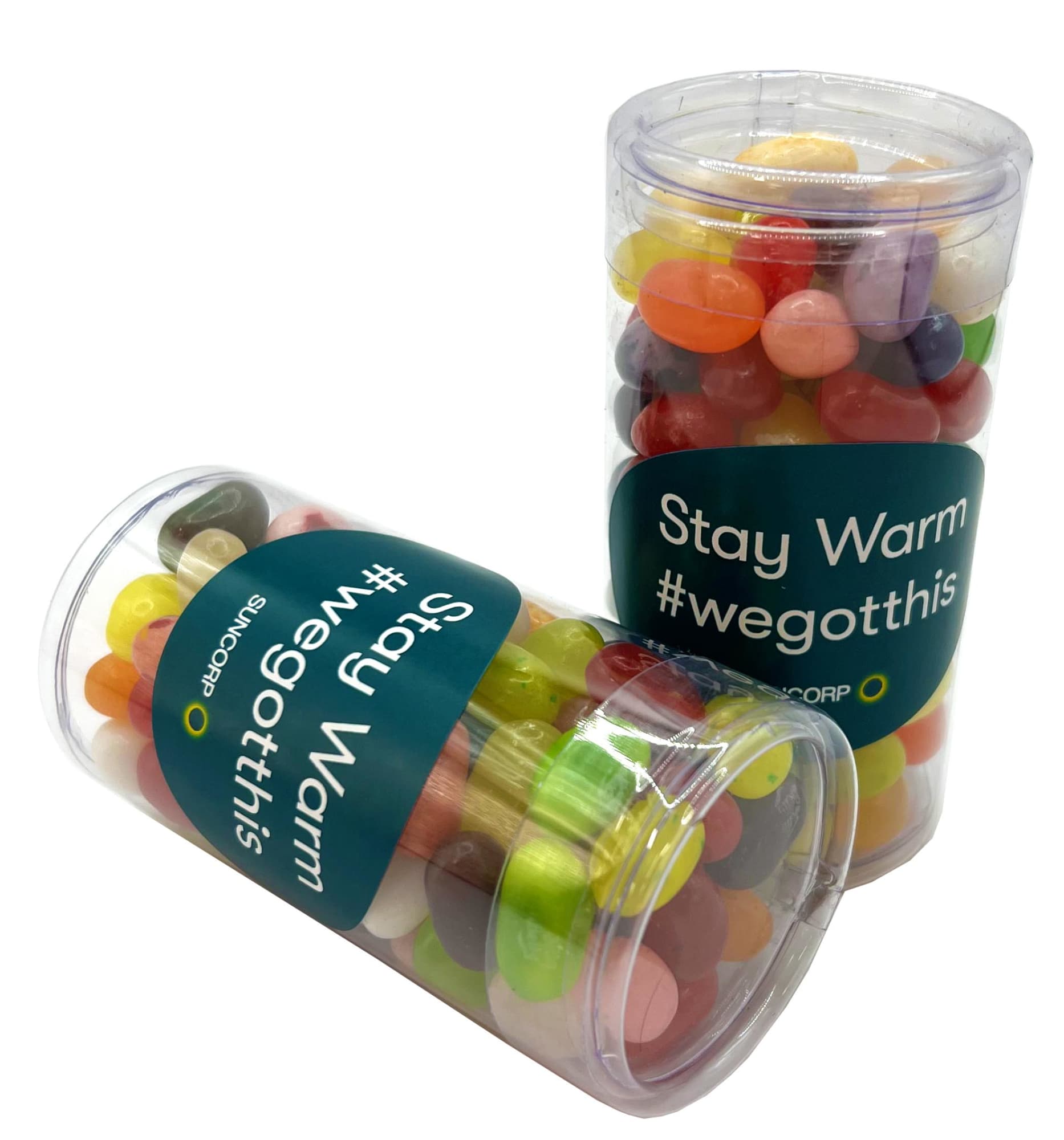A transparent PET tube containing colourful Jelly Belly jelly beans, with a visible branding label. Pet Tube with JELLY BELLY Jelly Beans 100g - Image 1