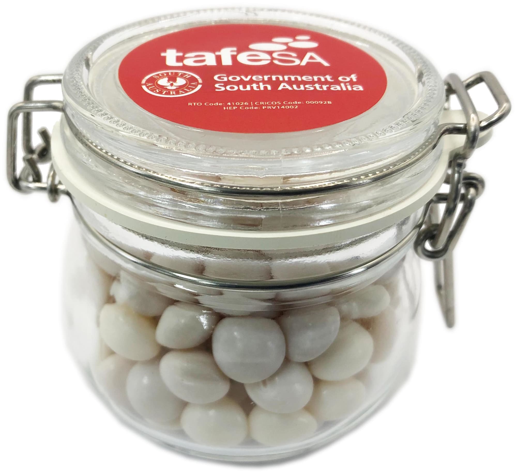 A glass canister filled with white chewy mints, featuring a lid and a logo on the top. Small Canister with Chewy Mints 130g - Image 1