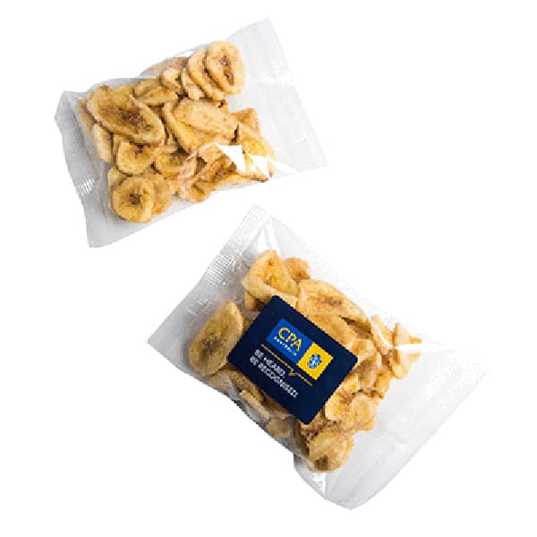 Two packets of banana chips, featuring light brown, crispy slices in a clear plastic packaging with a logo. Banana Chips 50g - Image 1