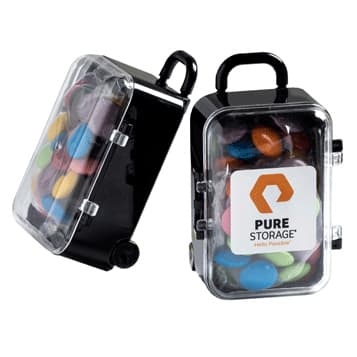 A carry-on case with a handle, featuring colourful choc beans inside and a logo on the front. Carry-On Case with Choc Beans 50g - Image 1