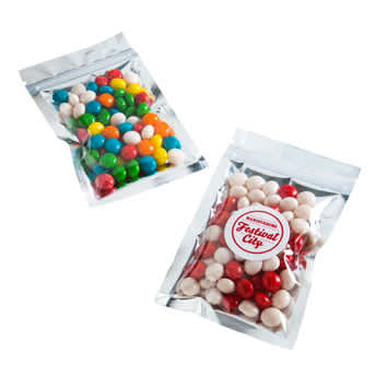 A silver zip lock bag containing colourful jelly beans in assorted shades, including red, green, and blue. Silver Zip Lock Bag with Chewy Fruits 50g - Image 1