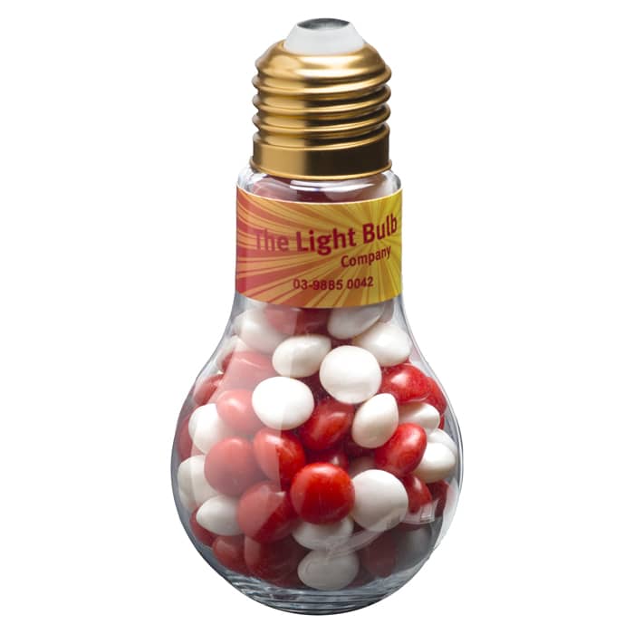 A light bulb-shaped container filled with red and white chewy fruits, featuring a gold top and a label. Light Bulb with Chewy Fruits 100g - Image 1