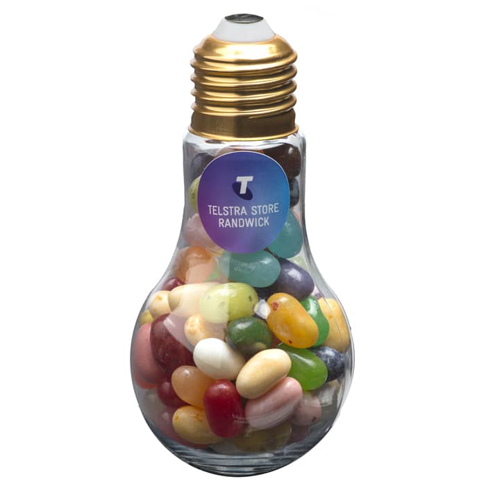 A glass light bulb filled with colourful jelly beans, featuring a golden cap and a logo. Light Bulb with JELLY BELLY Jelly Beans 100g - Image 1
