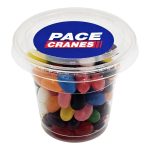 A clear tub filled with colourful mini jelly beans in various shades. The tub has a logo on the lid.