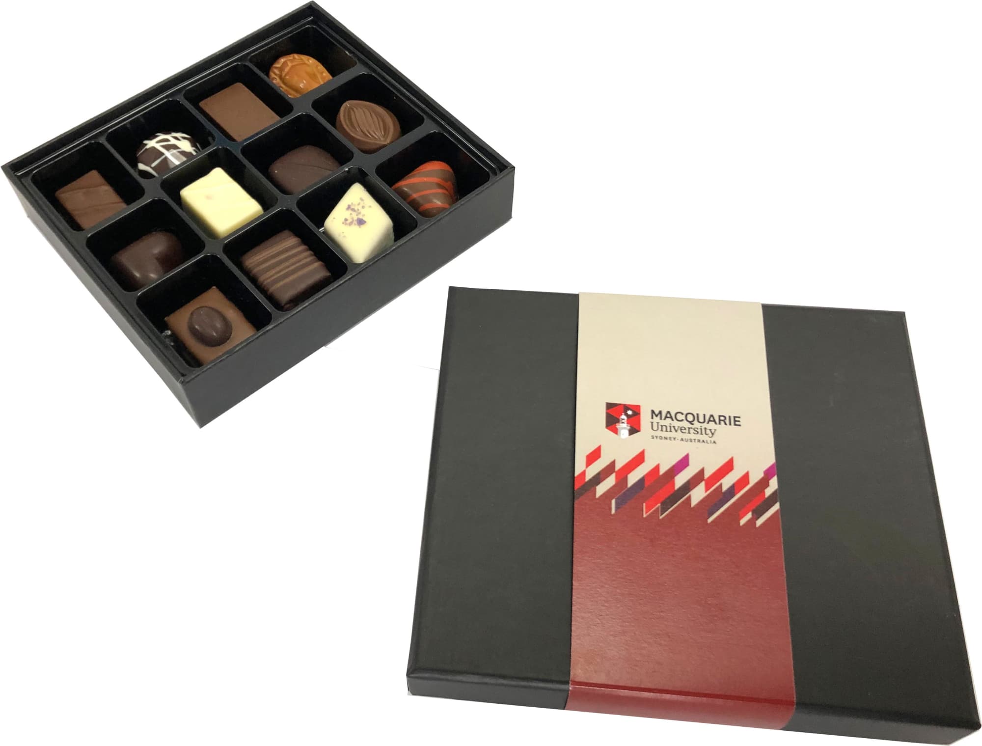A black box containing an assortment of praline chocolates in various shapes and colours. The box has a logo. A black box containing an assortment of praline chocolates in various shapes and colours. The box has a logo.
