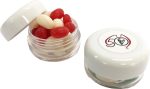 A small clear screw cap jar filled with red and white jelly beans, featuring a white lid and a logo on top.