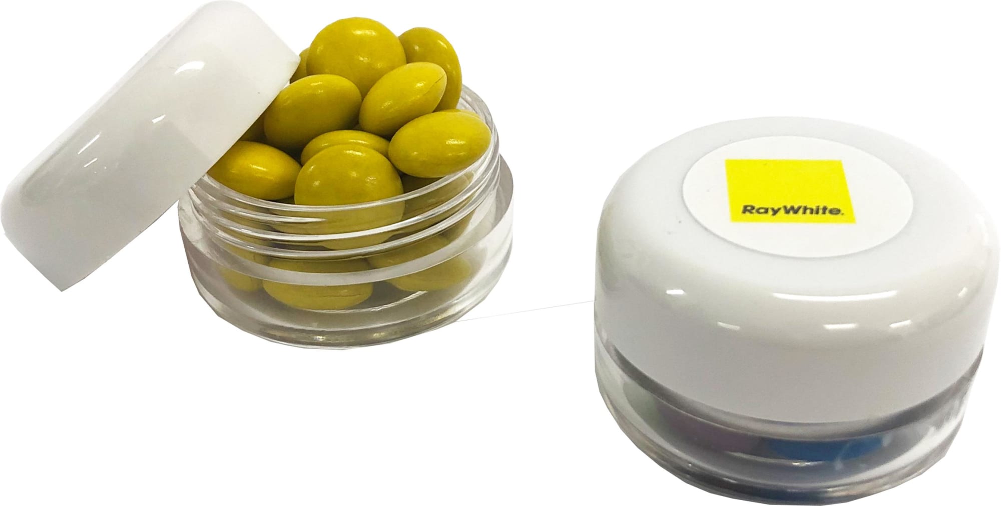A small clear screw cap jar containing yellow choc beans with a white lid and branding on the top. A small clear screw cap jar containing yellow choc beans with a white lid and branding on the top.
