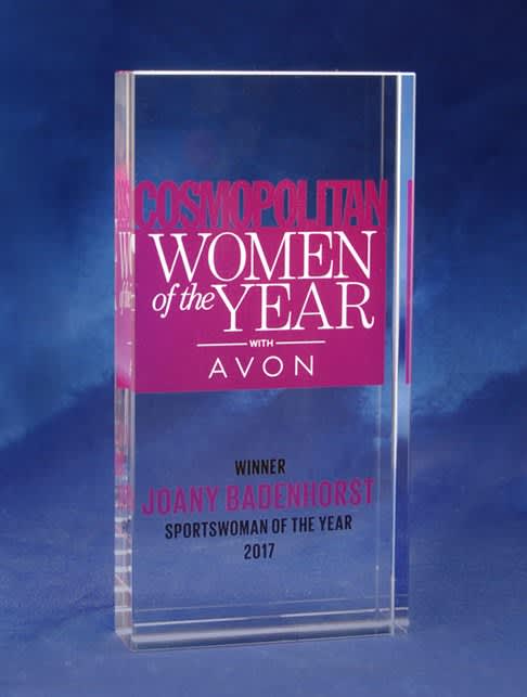 A clear optical crystal monolith with a colour-printed background, featuring pink text and branding elements. Optical Crystal Monolith - Colour Printed Background - Image 1