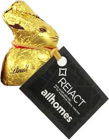 A 10g gold chocolate bunny with a tag attached, featuring a shiny gold foil wrapper.
