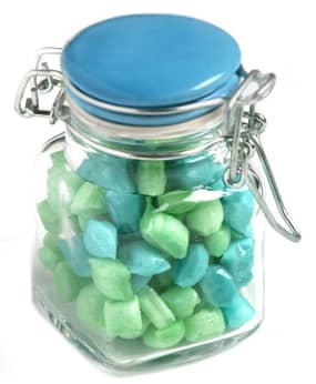 A glass clip lock jar filled with blue and green humbugs. The jar features a blue lid and a metal clasp. Glass Clip Lock Jar with Humbugs 80g - Image 1