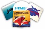 Four coasters featuring various designs, including vibrant colours and branding logos.