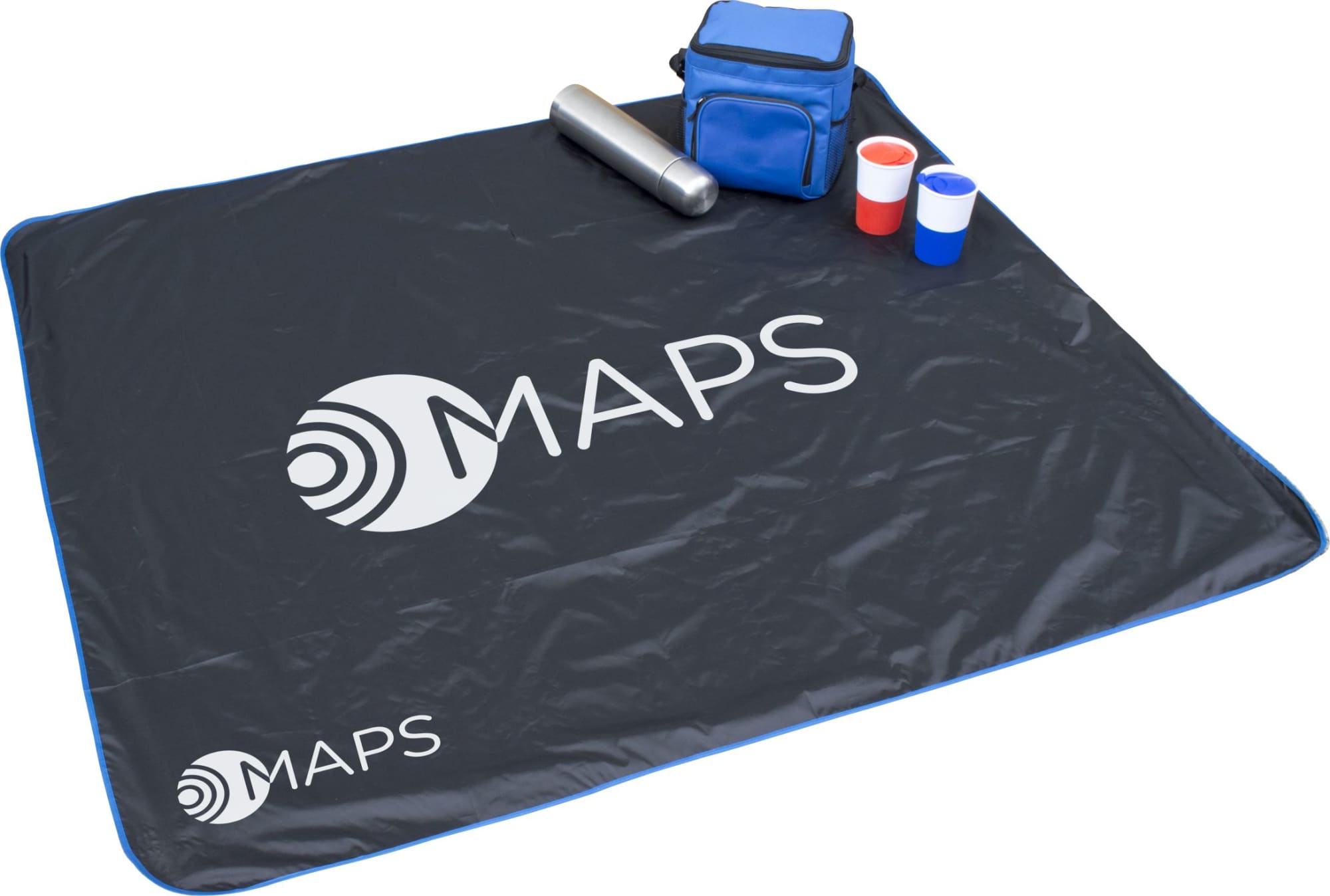 A black picnic mat with blue trim, a drink bottle, a blue cooler bag, and stacked cups in red and white. Compact Picnic Mat - Image 1