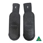 Black Crew Grip socks featuring a textured grip pattern and branding. Ideal for comfortable wear.