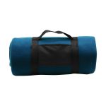 A rolled-up blanket in a teal colour, secured with a black strap. The blanket has a logo on the strap.