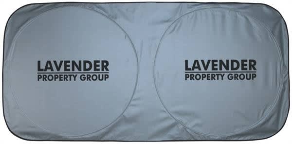 A grey sunshade with two circular cutouts and a prominent logo. Dash-Mate Sunshade - INDENT - Image 1