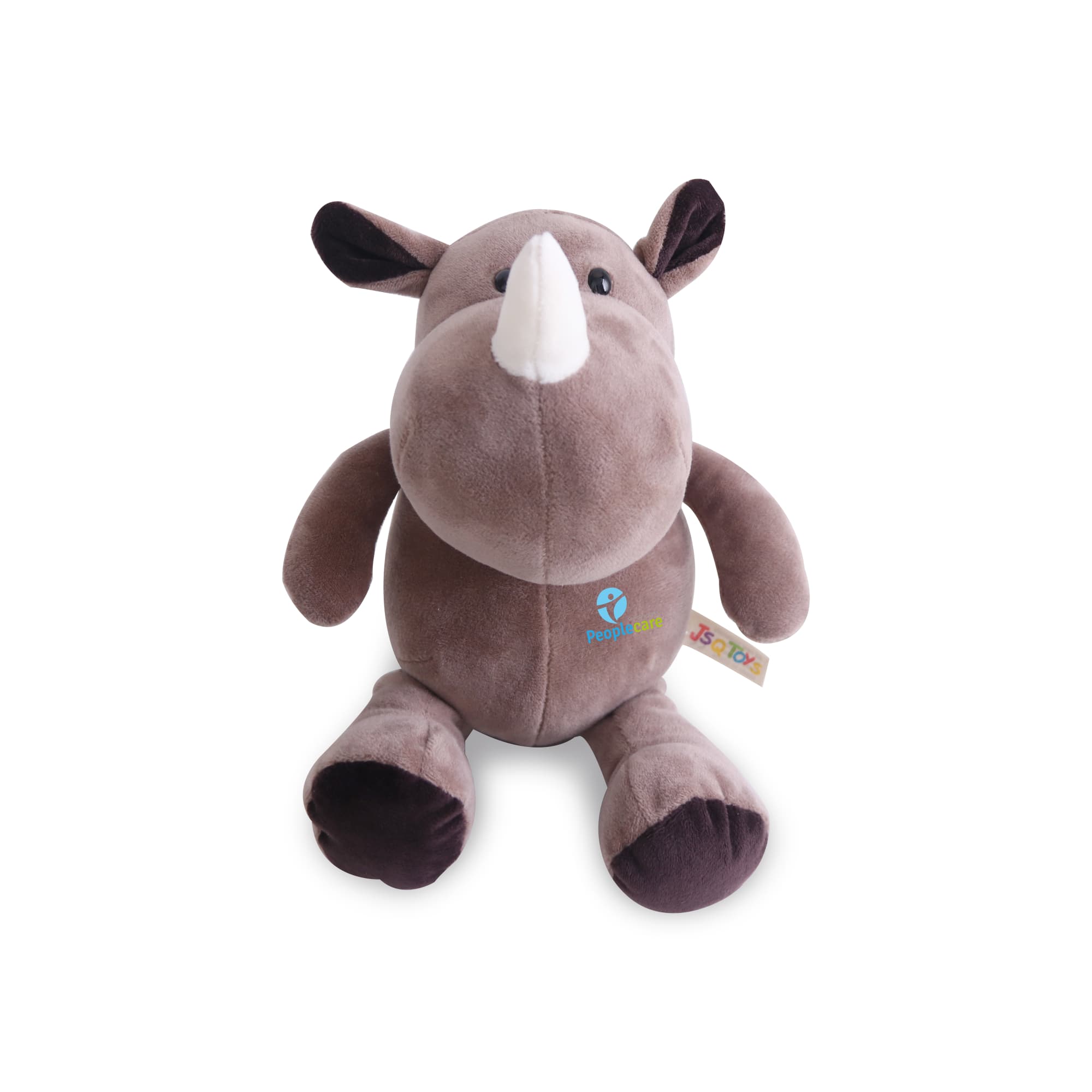 A brown rhinoceros plush toy with soft fabric, a white horn, and a small branding logo on its belly. Rhinoceros Plush Toy - Image 1