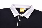 A sports jumper in navy blue with a white collar, featuring a logo on the label.