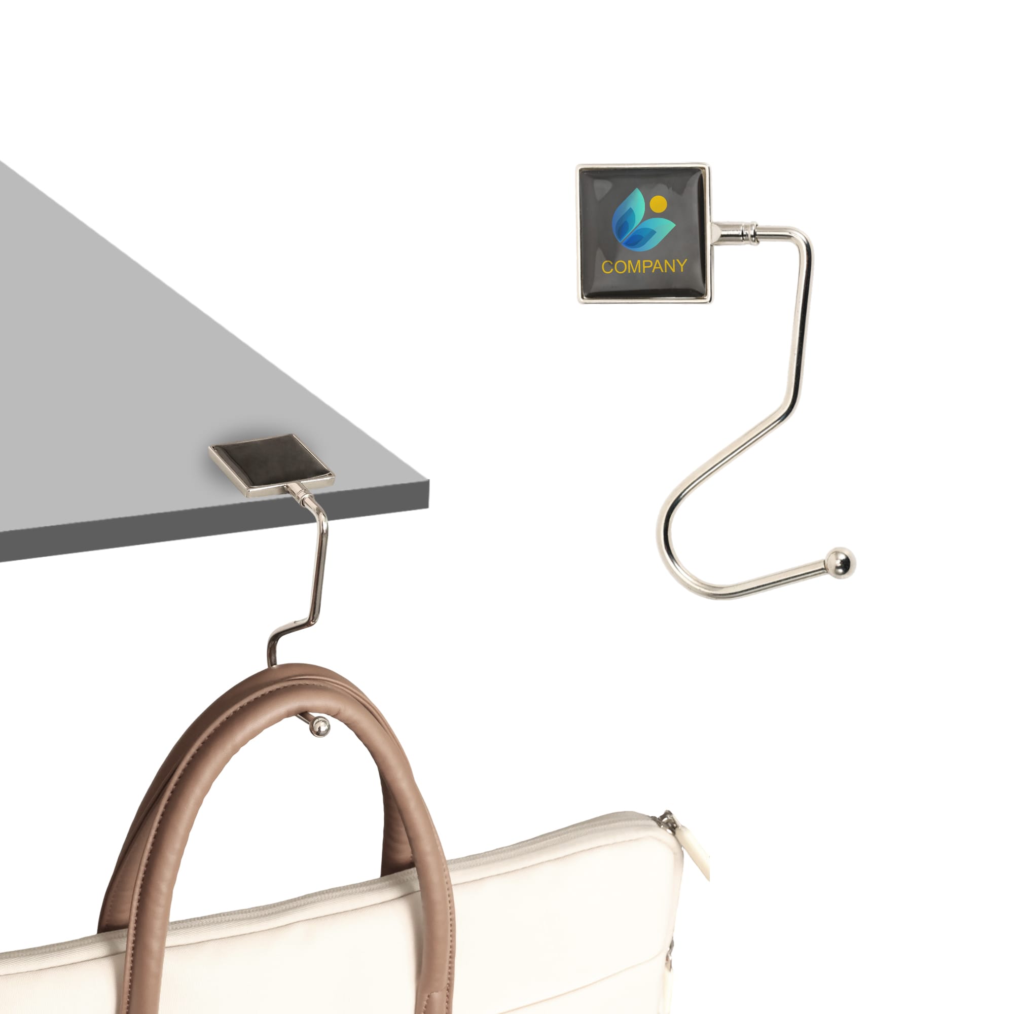 A silver curved desk hook features a square attachment with a logo, designed to hold bags or items. Square Curved Desk Hook - Image 1