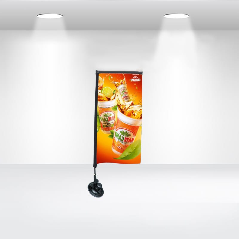 A suction cup flag featuring vibrant orange and green graphics of refreshing beverages on a black stand. Rectangle Suction Cup Flag - Image 1
