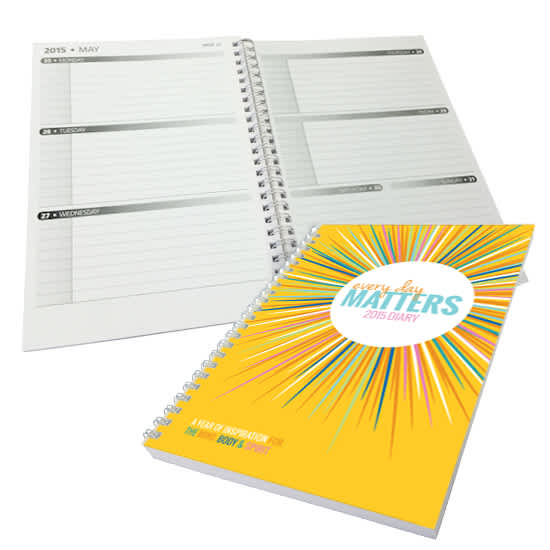 A5 diary with a bright yellow printed cover, featuring a spiral binding and week-to-view layout. A5 diary with a bright yellow printed cover, featuring a spiral binding and week-to-view layout.