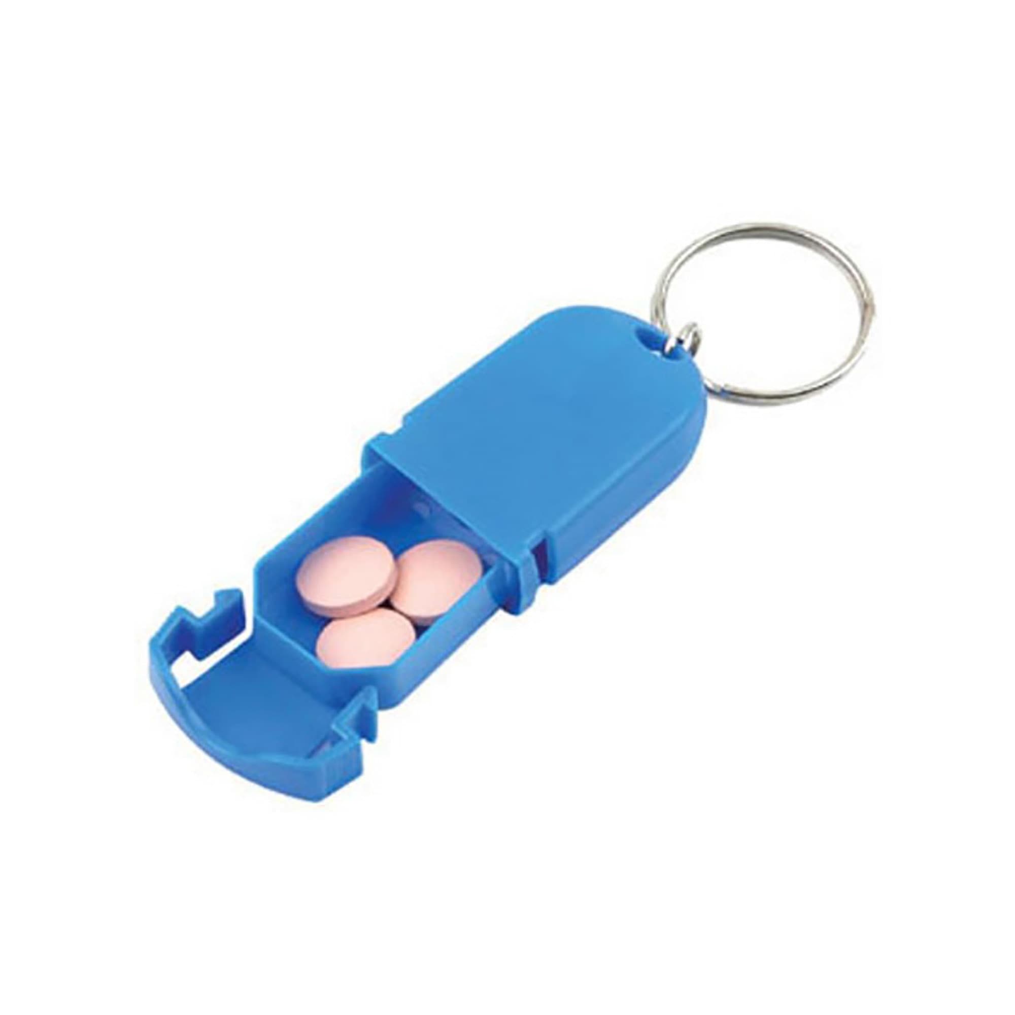 A blue pill box keychain containing pink tablets, featuring a secure flip-top design and a keyring attachment. Pill Box - Image 1