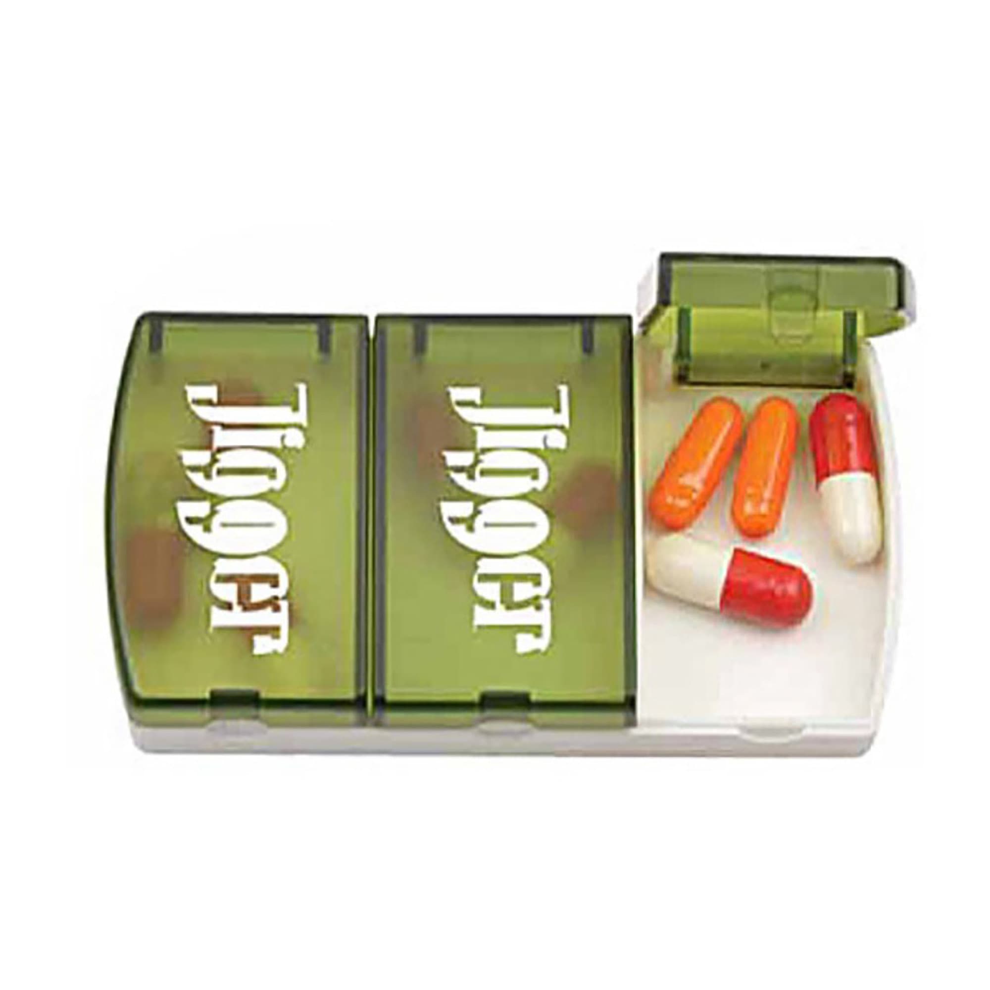 A pill box with a transparent green lid and compartments filled with red and white capsules, alongside orange capsules. Pill Box - Image 1