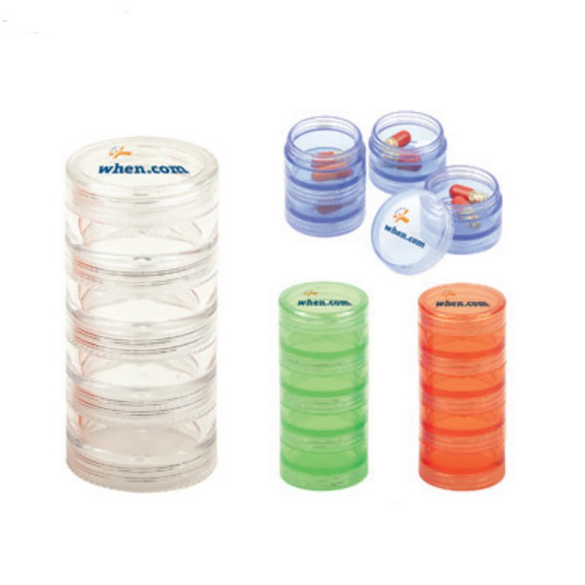 A transparent pill box with multiple compartments in clear, green, and blue colours, featuring a logo. Pill Box - Image 1
