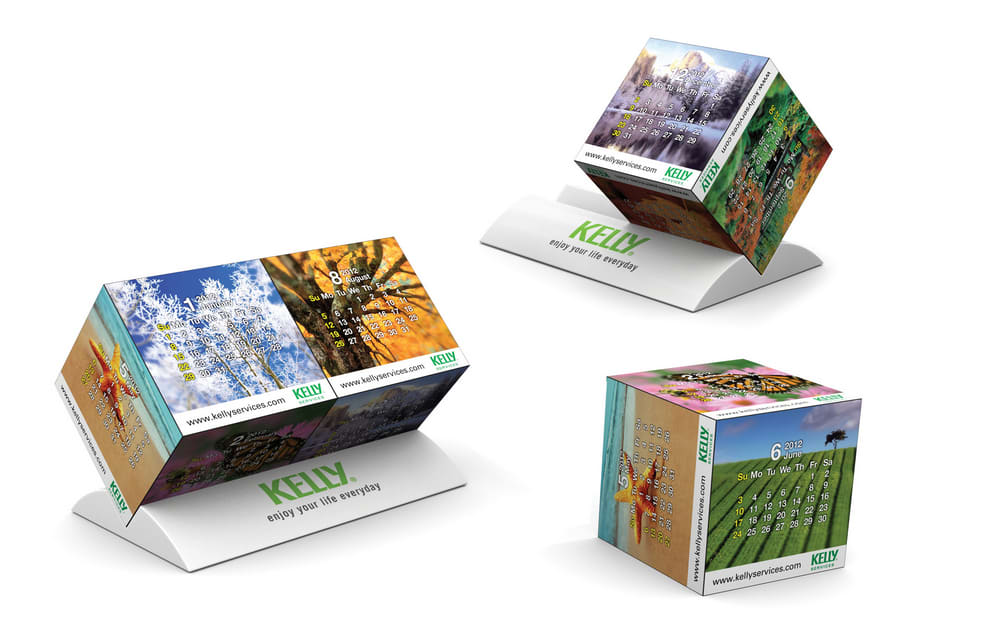 A promotional calendar featuring vibrant images and a stand, designed in multi-coloured graphics with a logo. Magic Duo Stand - Image 1