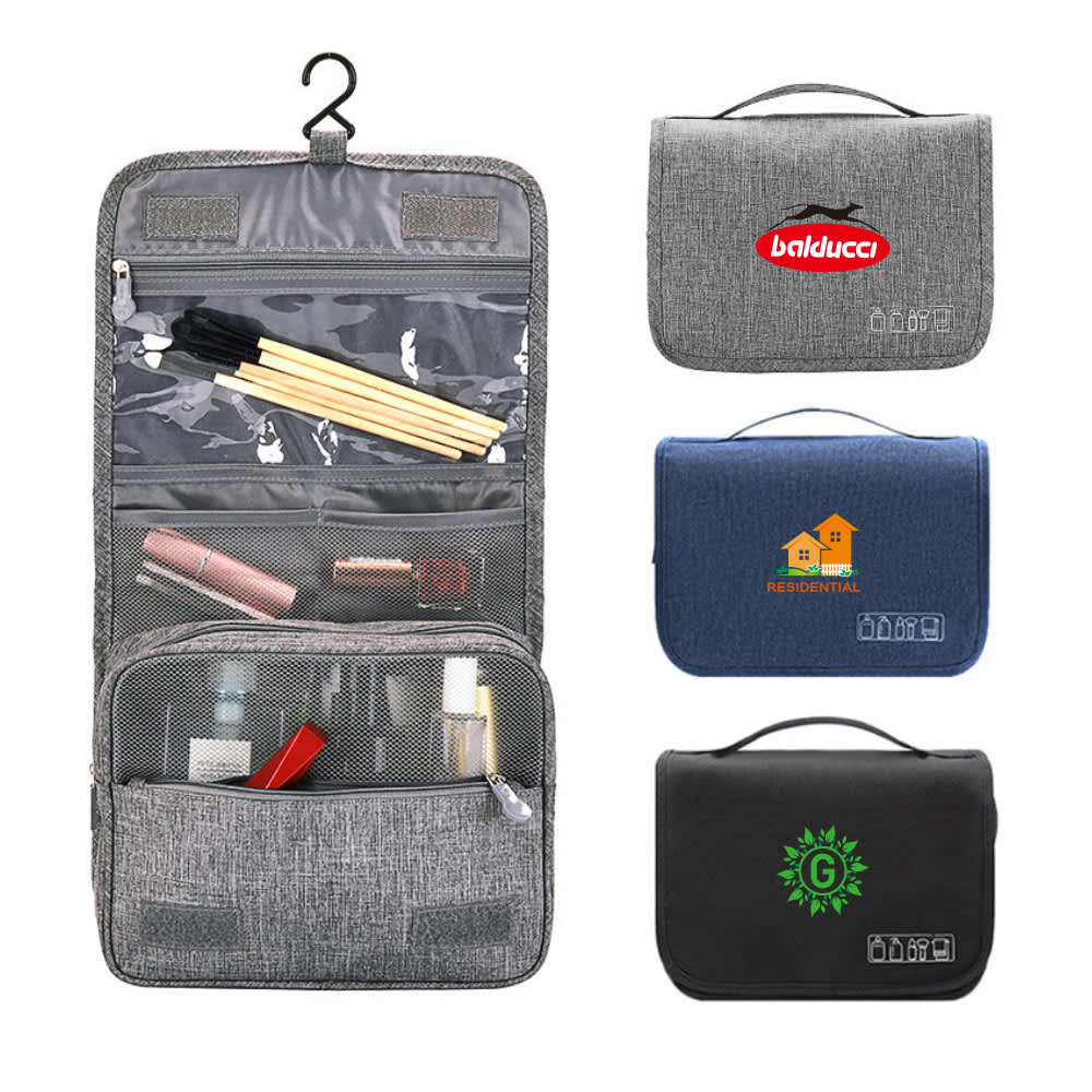 A grey travel hanging toiletry bag with multiple compartments, featuring mesh pockets and a hanging hook. Travel Hanging Toiletry Bag - Image 1