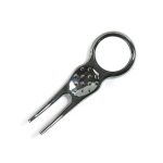 A chrome pitch repairer with a ring for attachment and a textured surface for grip.