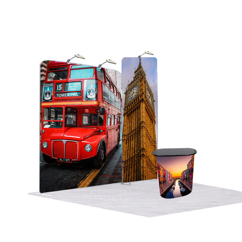 A red double-decker bus and a clock tower graphic on fabric displays, with a black display table. Stretch Fabric Display / Tension Fabric Display Exhibition Booths Type A - Image 1