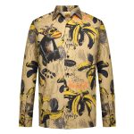 A long-sleeve shirt featuring a vibrant design with yellow bananas and a monkey illustration on a beige background.
