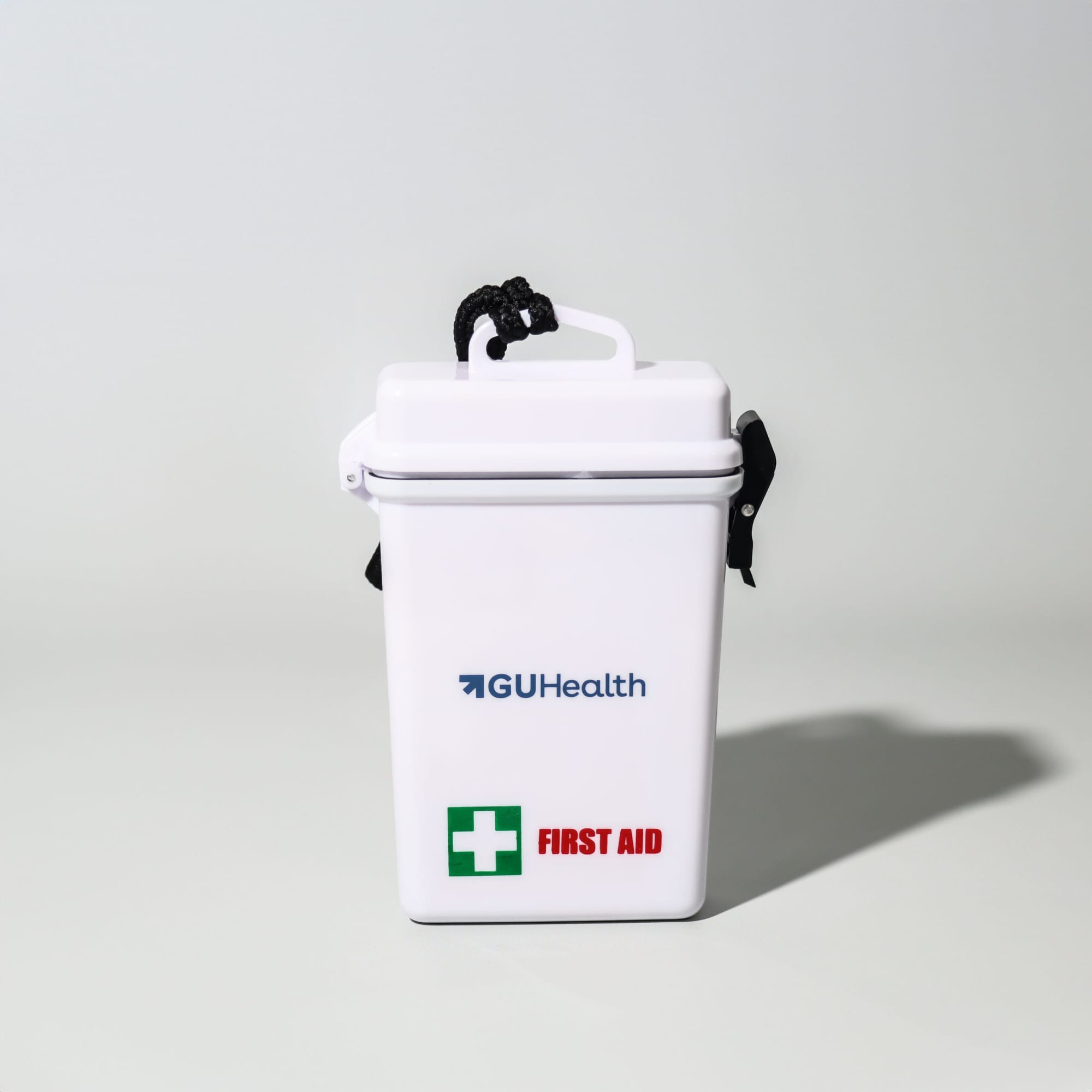 A waterproof white first aid kit with a black handle and logo, featuring a red cross symbol on the front. First Aid Kit Waterproof 21pc - Image 1