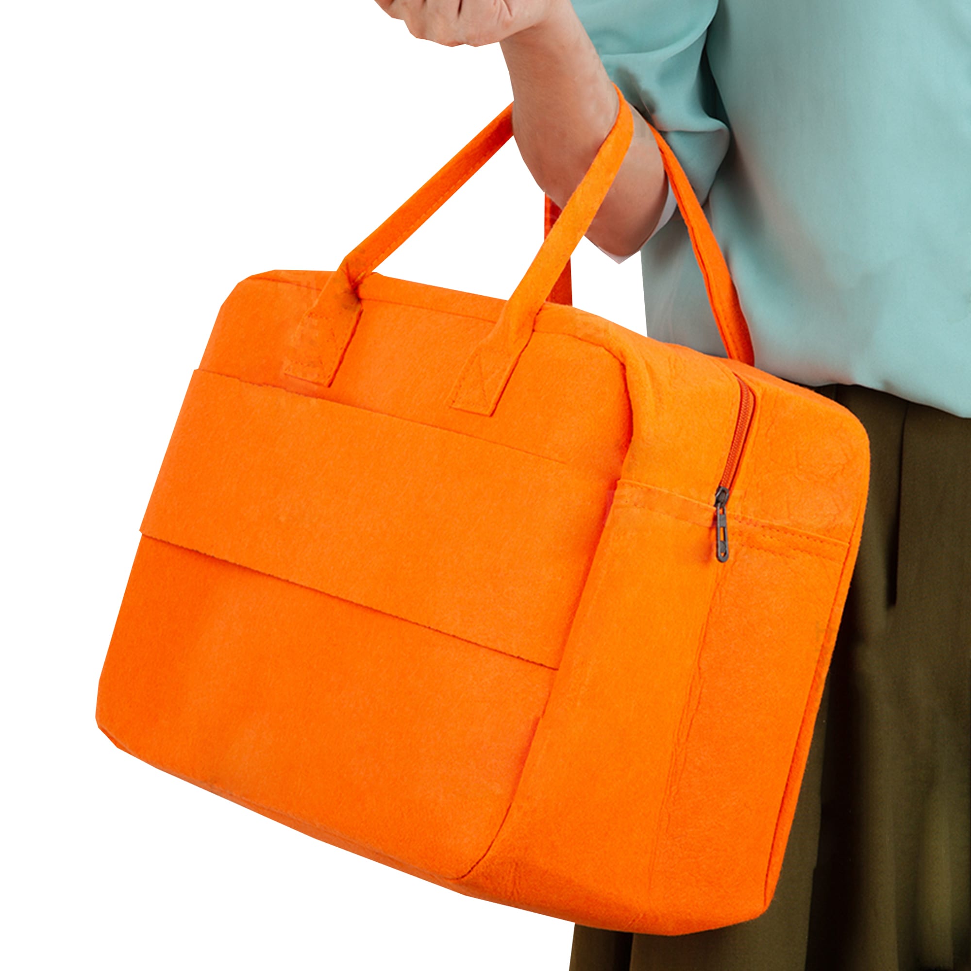 An orange felt travel bag with two handles and a zipped compartment, held by a person. Mecca Felt Travel Bag - Image 1