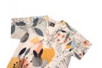 A Hawaiian shirt featuring a floral design in yellow, orange, blue, and white, with short sleeves and a logo.