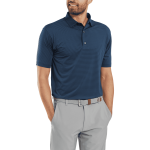 A men's navy polo shirt with a collar and short sleeves, paired with light grey trousers. The model has a branded belt.