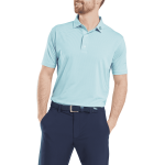 A light blue men's polo shirt with a collar, featuring a small logo, paired with dark trousers.