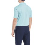 A men's short-sleeve polo shirt in light blue, featuring a subtle strip and a collar, with a dark background.
