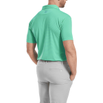 A men's short-sleeve polo shirt in turquoise with a collar, featuring a logo on the back and grey trousers.