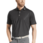 A black polo shirt with a collar and short sleeves, featuring a logo on the neckline. The model wears grey trousers.