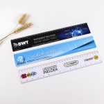 Three flexible rulers in blue and white, each with different designs and branding, measuring 310 x 40mm.