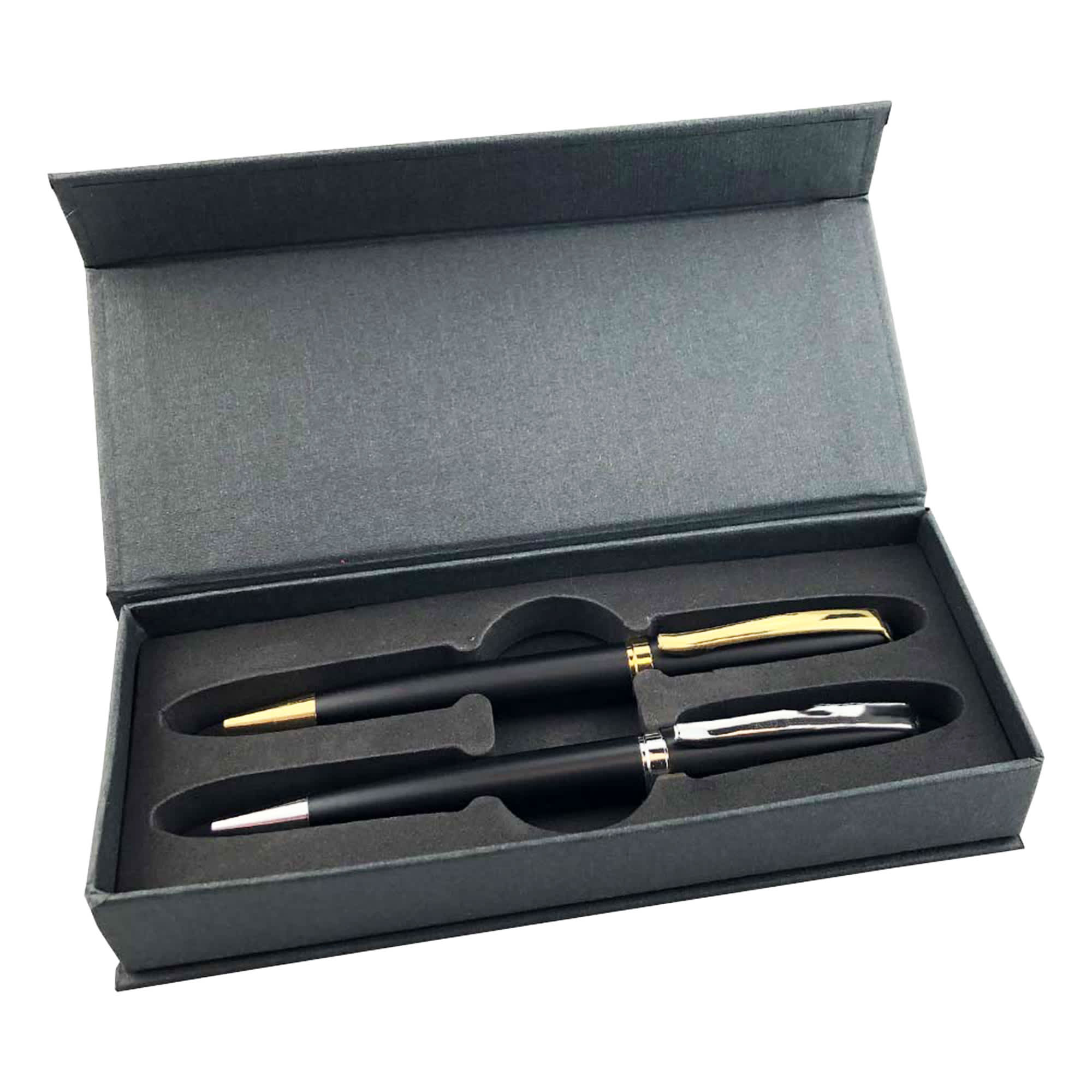 A black and gold metal pen gift set displayed in a grey box, featuring two pens with a logo. Prime Premium Pen Gift Set - Image 1