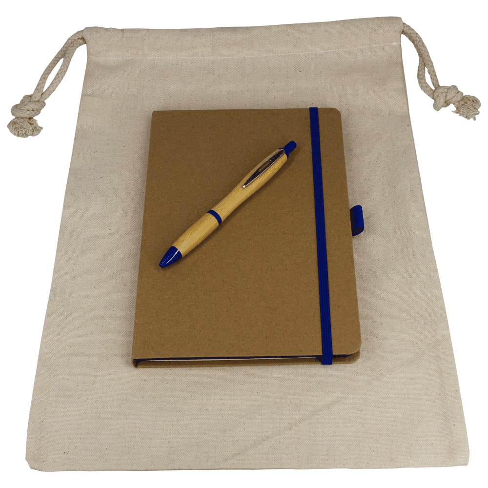 A drawstring bag in cream holds a brown JournalBook with a blue elastic band and a blue pen on top. Gift Set - Drawstring Bag + JournalBook + Pen - Image 1