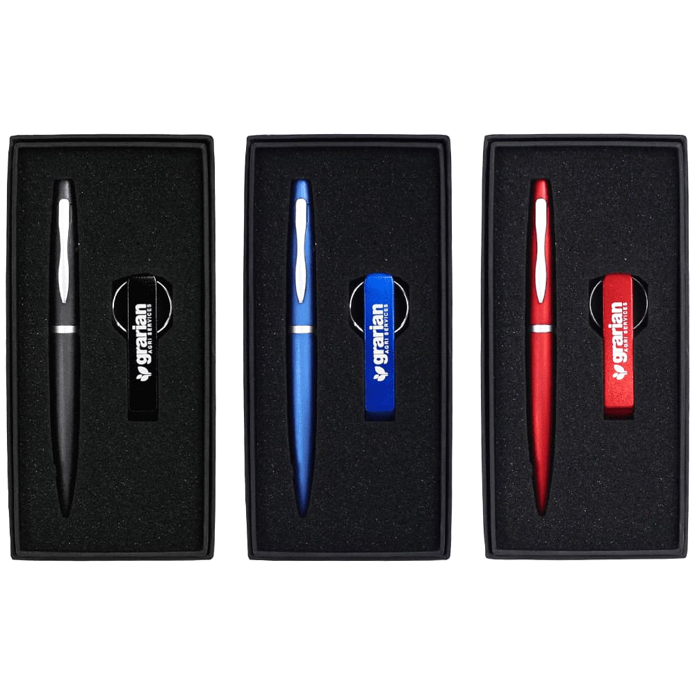 A drink bottle opener keyring set featuring a black, blue, and red pen, all presented in sleek gift boxes. Chicago Pen & Bottle Opener Keyring Gift Set - Image 1