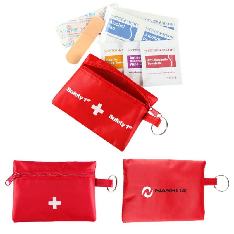 A red first aid travel kit containing 22 pieces, including wipes, pads, and a bandage, with a logo. First Aid Travel Kit - 22 Piece - Image 1